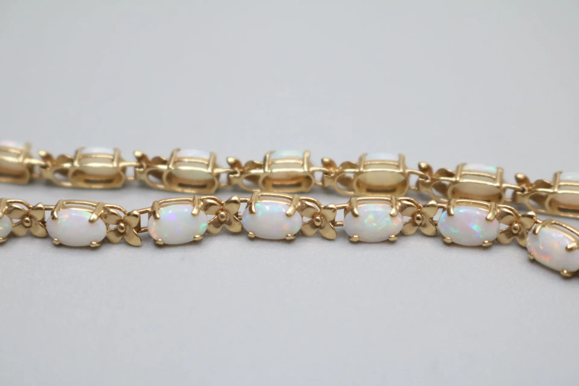 14K Yellow Gold Oval Prong Set Opal Tennis Bracelet (7 Inches)