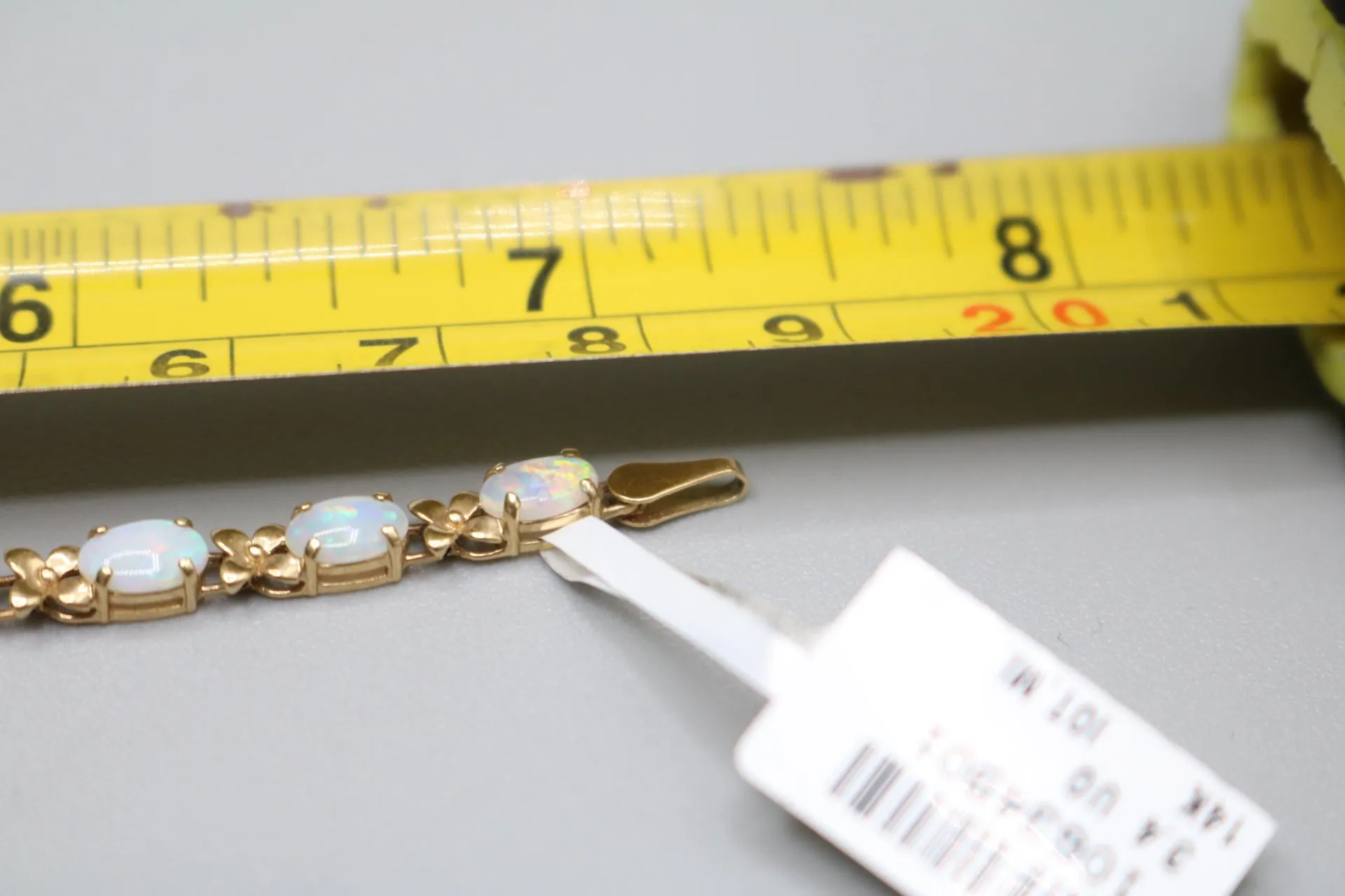 14K Yellow Gold Oval Prong Set Opal Tennis Bracelet (7 Inches)