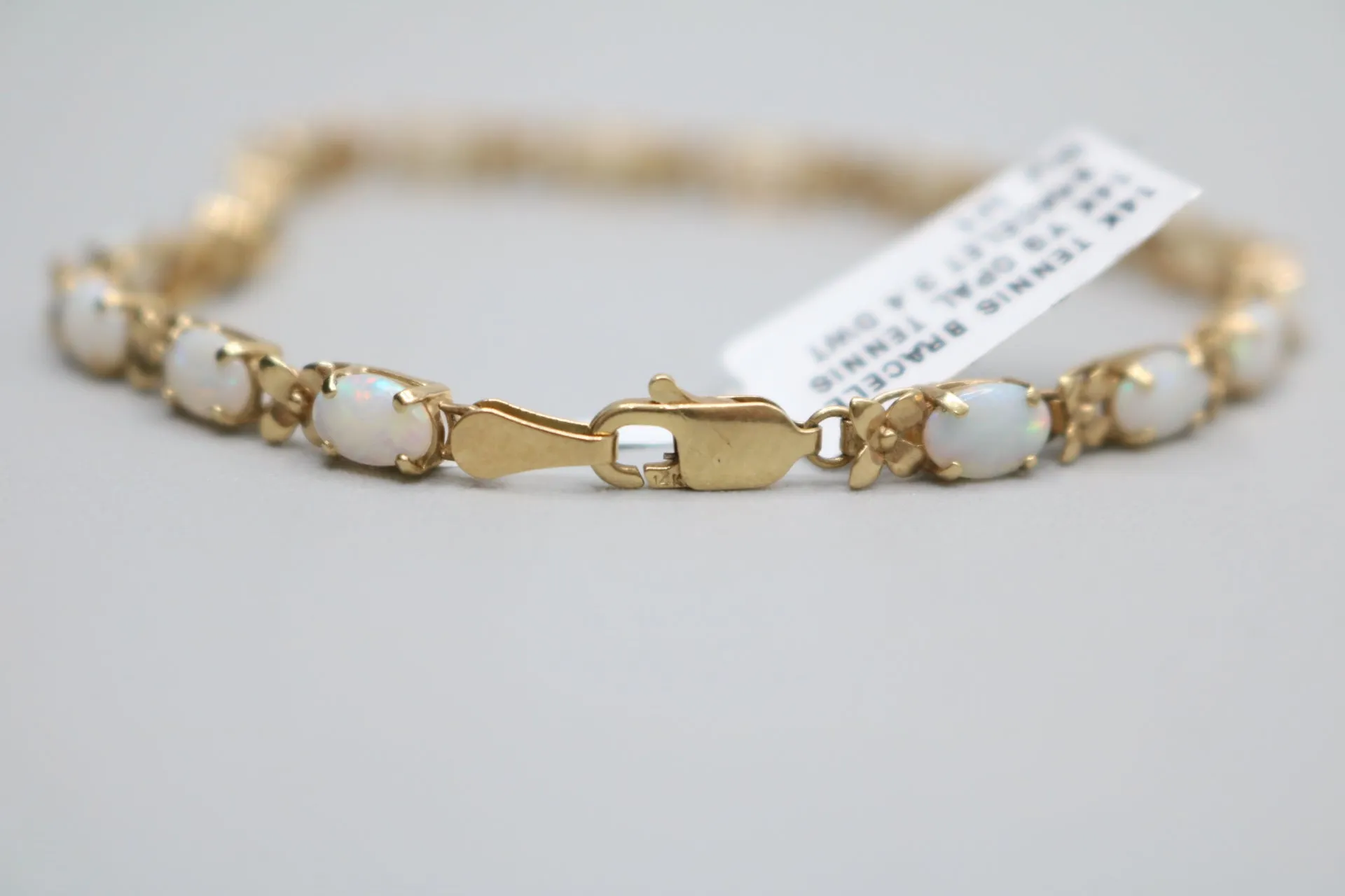 14K Yellow Gold Oval Prong Set Opal Tennis Bracelet (7 Inches)