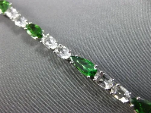 ESTATE 10.19CT PERIDOT & WHITE QUARTZ 18K WHITE GOLD MULTI SHAPE TENNIS BRACELET