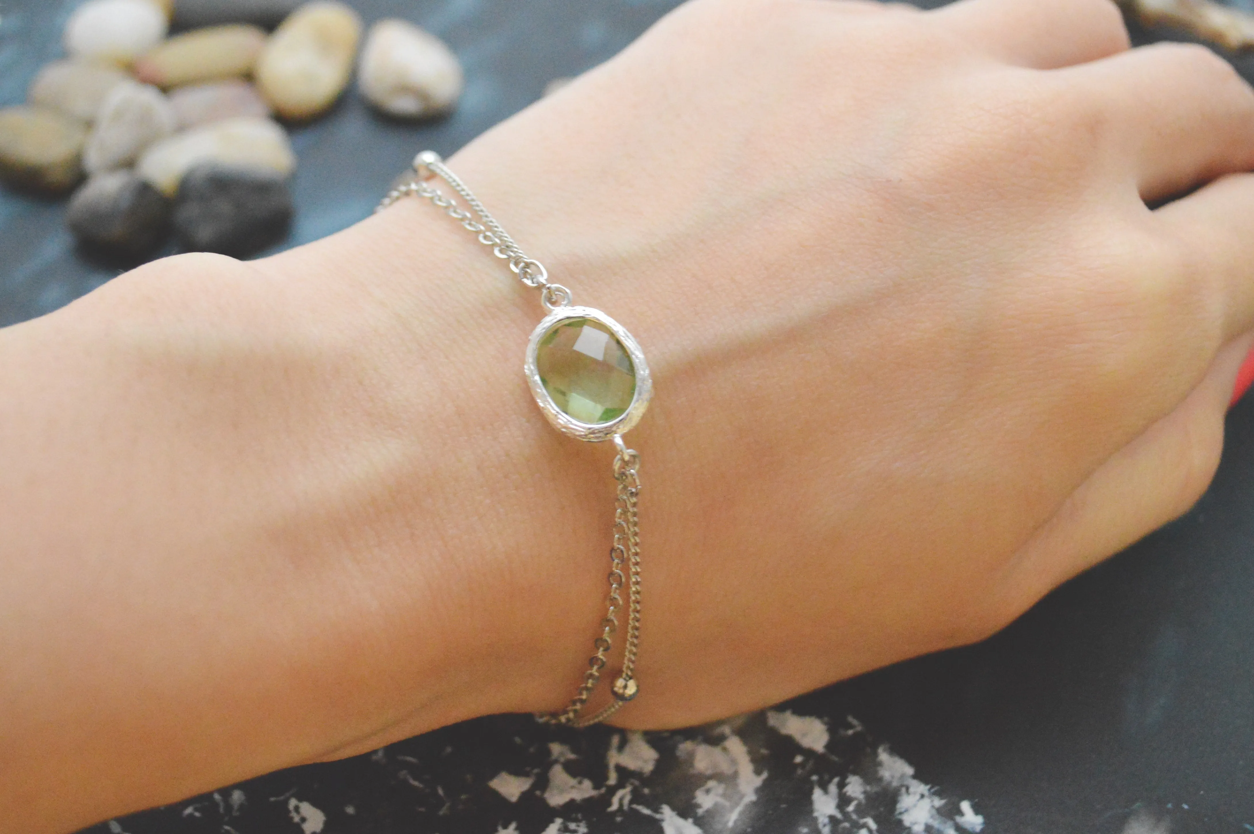 White gold double layered peridot bracelet