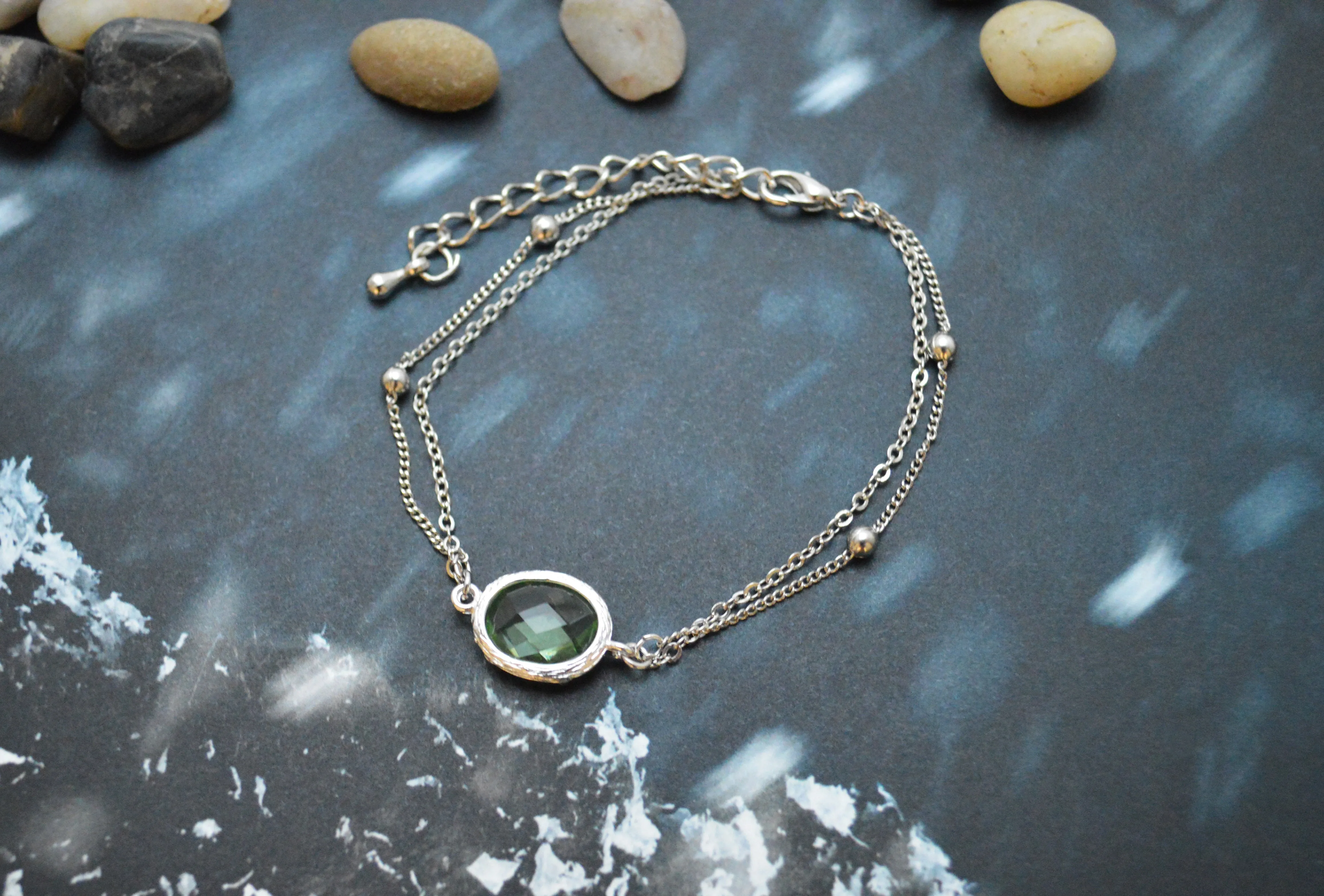 White gold double layered peridot bracelet